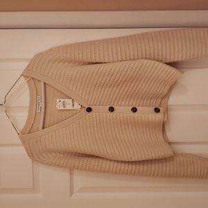 Woman's long sleeve button front cardigan.  Never worn.